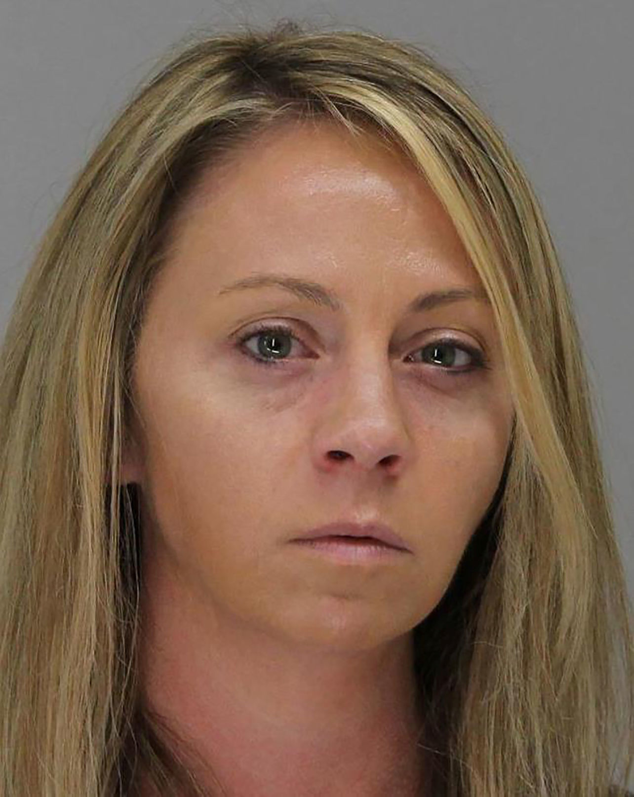 Former Dallas police officer Amber Guyger poses for a booking photo at Dallas County Jail